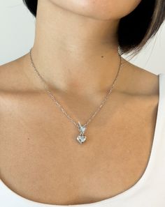 Edgy Aesthetic x Romantic Vibe = This 3D chrome heart necklace. Wear alone or stack it up for an even more unique look. Pair it with the matching bracelet for the perfect set. Details: Metal: Sterling Silver with Rhodium Plating & Anti-Tarnish Coating Pendant: 10.79 x 11.60mm Length: 17" Chain Toggle Clasp Silver Double Heart Necklace Tarnish Resistant, Tarnish-resistant Silver-tone Heart Necklace, Silver Heart Necklace Tarnish Resistant, Heart-shaped Silver Necklace, Tarnish Resistant Silver Heart Necklace, Tarnish Resistant Heart Shaped Silver Necklace, Silver Tarnish-resistant Double Heart Necklace, Silver Tarnish-resistant Heart Necklace For Everyday, Silver Tarnish-resistant Heart Necklace