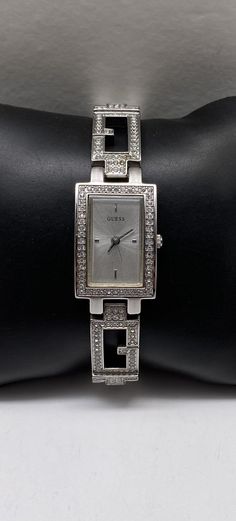 Beautiful Guess SS Crystal Incrusted Women's Watch pre/owned condition new battery installed measures 6 3/4" length by 3/4" width. Watch 561472 Graceful Lady Watch, Guess Watch, Women Wrist Watch, Women's Watch, Wrist Watches, Favorite Jewelry, Womens Watches, Wrist Watch, Jewelry Watches