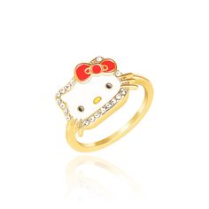 a gold ring with a hello kitty face on the front and diamond accents around it