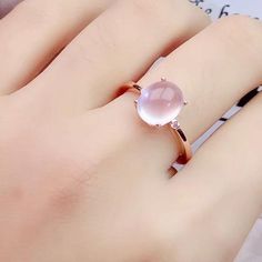 Welcome to Elegant Art Jewelry!  Stone: Natural Rose Quartz Stone Size: ( Pendant, 8mm×10mm ), ( Earring, 8mmx10mm ), ( Ring, 8mmx10mm ) Side Stone: Zircon Metal: 925 Sterling Silver Personalization: 9K/14K/24K/GOLD/SILVER/PLATINUM/ROSE-GOLD/WHITE GOLD. (Contact me)  Rose Quartz Pendant, Rose Quartz Cuff Pendant, 925 Sterling Silver Pendant, Oval Shape Pendant, Rose Quartz Pendant, Rose Quartz Engagement, Open Design Pendant, Rose Quartz Oval, Rose Quartz Natural, Pink Rose Quartz, Pink Rose Qua Rose Gold Rings For Mother's Day, Rose Colored Round Jewelry For Mother's Day, Round Rose-colored Jewelry For Mother's Day, Rose-colored Round Jewelry For Mother's Day, Rose Colored Round Jewelry For Valentine's Day, Round Rose Jewelry For Valentine's Day, Rose-colored Round Jewelry For Valentine's Day, Pink Oval Cabochon Rings As Gift, Pink Oval Cabochon Rings For Gift