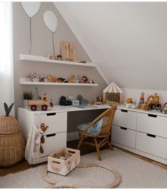 a child's room with toys on the shelves