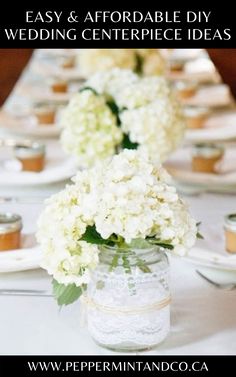 EASY & AFFORDABLE DIY WEDDING CENTERPIECE IDEAS Diy Centerpieces Round Table, Inexpensive Flowers For Wedding, Easy Rehearsal Dinner Centerpieces, Rehearsal Dinner Decorations Table Simple Centerpiece Ideas, Simple Wedding Centerpieces Round Tables, Mason Jar Hydrangea, Ideas Bautizo, Affordable Wedding Centerpieces, Hydrangea Centerpiece Wedding