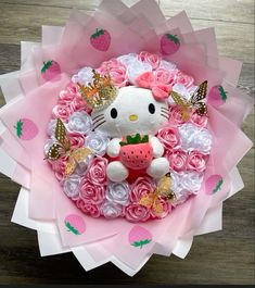 a hello kitty bouquet made out of pink roses