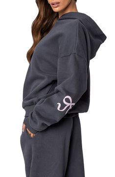 Sweet and cozy, this bow-detailed hoodie features a relaxed, slouchy fit with dropped shoulders and a soft cotton-blend fabrication that'll keep you ultracomfy. Fixed hood Ribbed cuffs and hem 50% cotton, 50% polyester Machine wash, dry flat Imported Alfriceden Hoodies, Mysterious Clothes, Hoddies Outfits Woman, Off The Shoulder Hoodie, Sweat Outfits For Women, Off Shoulder Hoodie, Bow Hoodie, Hoddies Outfits, Dark Grey Hoodie