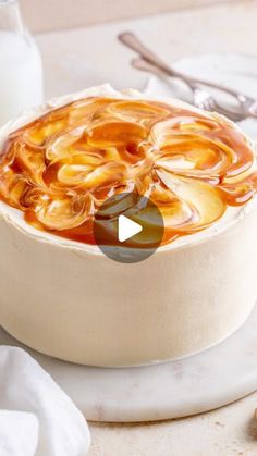 a video demonstrating how to make a caramel swirl cheesecake