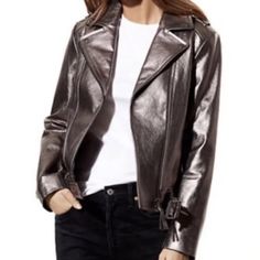 Introducing The Mackage Metallic Leather Moto Jacket Pewter, A Stylish And Edgy Addition To Your Wardrobe. This Jacket Is Crafted With High-Quality Leather And Features A Mid-Length Design. It Comes In A Beautiful Gray Color With A Metallic Finish That Adds A Touch Of Glam To Your Outfit. Missing The Size Tag Fits As An Xsmall. Metallic Fitted Outerwear For Fall, Metallic Long Sleeve Leather Jacket For Spring, Chic Metallic Outerwear For Winter, Luxury Metallic Outerwear For Fall, Trendy Metallic Biker Jacket For Fall, Trendy Metallic Biker Jacket For Winter, Metallic Fitted Leather Jacket For Winter, Fitted Metallic Biker Jacket For Winter, Chic Metallic Winter Outerwear