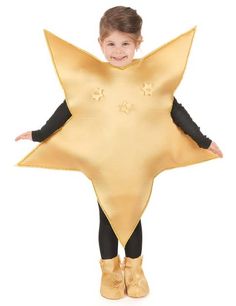 a little boy dressed in a gold star costume