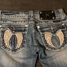 These Jeans Are Still In Almost Brand New Condition With No Problems Or Stains Of Any Kind. The Angel Wings On The Back Of The Skinny Jeans Have Rhinestones On Them. These Are Skinny Couture Jeans Size: 26 For Women Couture Jeans, The Angel, Miss Me Jeans, Miss Me, Colored Jeans, Angel Wings, Jeans Size, Blue White, Wigs