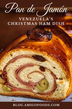 a close up of a pastry with meat and cheese in it on a plate next to the words pan de jamon venezuela's christmas ham dish