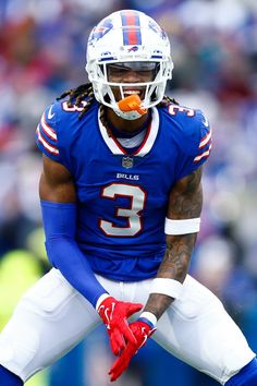 a close up of a football player wearing a helmet