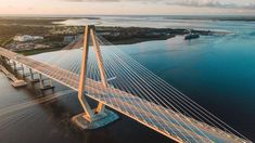 an aerial view of a bridge over water