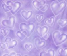 a purple background with lots of hearts on it