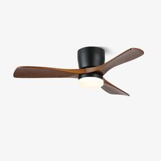 a ceiling fan with two wooden blades and a light on the bottom one is black