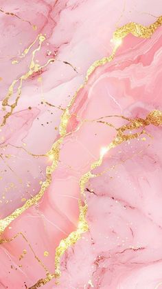 pink and gold marble wallpaper with golden glitters on the edges, as well as an abstract design