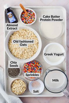 ingredients to make an oatmeal smoothie laid out on a tray