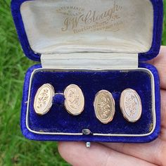 A lovely pair of antique 9ct gold cufflinks in nice condition with presentation box. The cufflinks are oval in shape with foliage engravings to all face sides and are connected with curb link chain . The total weight is approx. 6.9 g and they are hallmarked with date letter "o" for 1933. There are minor surface scratches commensurate with age and the presentation box is in antique condition. Please see listing photos for measurement. Please check out the other items in my shop. Be sure to view a Luxury Vintage Cufflinks For Anniversary, Antique Hallmarked Cufflinks For Wedding, Hallmarked Antique Cufflinks For Wedding, Antique Gold Cufflinks, Antique Engraved Cufflinks For Wedding, Antique Gold Cufflinks For Collectors, Formal Jewellery, Formal Jewelry, Gold Cufflinks