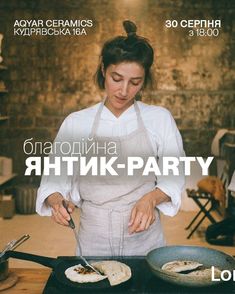 a woman in an apron is preparing food on a pan with a knife and fork