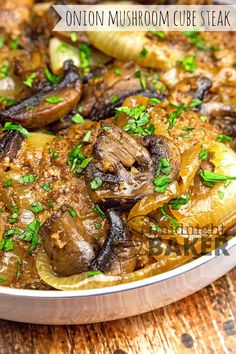 the dish is prepared and ready to be eaten with onions, mushrooms, and other vegetables