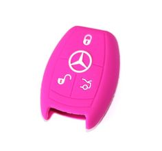 a pink car key cover with the mercedes logo on it's front end and side buttons