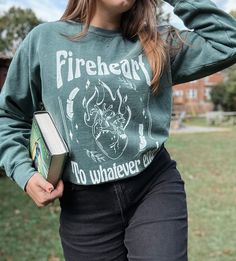 To whatever end Fireheart. If you love Aelin and Rowan, you need this cozy & soft bookish shirt! OFFICIALLY LICENSED SARAH J MAAS MERCH From Kingdom of Ash, by Sarah J. Maas, © 2018. Artwork by Cait's Curio Corner.  Created with permission of Writers House LLC acting as agent for the author. ✨ SWEATSHIRT QUALITY Comfort Colors Crewneck 80% ring-spun cotton, 20% Polyester Medium fabric Relaxed, unisex fit Soft washed garment Highly Durable ✨PRINT QUALITY We use Direct to Garment Printing with high quality ink. Colors shown on your monitor may differ slightly from the actual item. ✨HOW TO ORDER:  -Pick your shirt size. -Pick your favorite color. ✨SIZING CHART: Our sweatshirts are unisex sizing (looser fit for women). Please see images for measurements. For best results, take your favorite sh Cotton Fandom Graphic Sweatshirt, Cotton Graphic Print Fandom Sweatshirt, Cotton Fandom Sweatshirt With Graphic Print, Cotton Sweatshirt With Graphic Print For Fandom, Winter Bookish Cotton Sweatshirt, Bookish Cotton Sweatshirt For Winter, Winter Cotton Sweatshirt, Cotton Fandom Sweatshirt For Streetwear, Relaxed Fit Bookish Sweatshirt For Fall