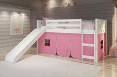 a white bunk bed with pink tent and slide