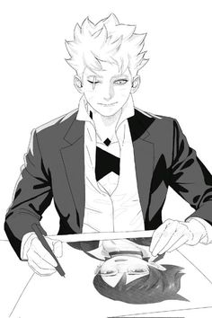 a man in a suit sitting at a table with a knife and fork on it