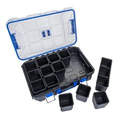 an open blue and white case filled with lots of trays next to each other