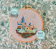 an embroidery kit with a castle on it