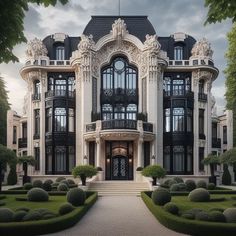 a large white building with lots of windows and balconies