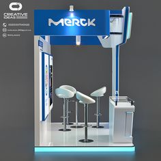 an exhibition stand with stools and chairs in front of the sign for merck