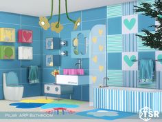 a bathroom with blue and yellow decor on the walls