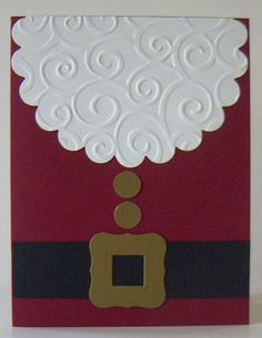 a red and white christmas card with a santa's hat on it, made from paper