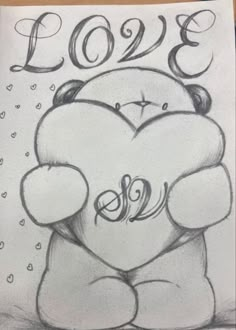 a drawing of a teddy bear holding a heart with the word love written on it