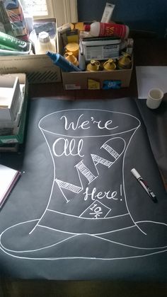 a chalk board with writing on it that says, we're all free here