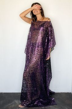 * Please Note: All Sale Items Are Final Sale* Huracan Caftan in Fuschia from Taller Marmo A sheer sequin showstopper Deep purple sequin clusters over hand painted purple black mesh Caftan sleeve on one side, open vented sleeve on other side Lots of length and oversized fit 100% PL One size Made in Italy Model Measurements & Item Sizing: Model Height: 5'8” Model size: US 2 / S / 26 Size shown on model: one size Our Notes: life's too short to wear boring dresses Taller Marmo, Life's Too Short, Life Is Short, Black Mesh, Purple Black, Deep Purple, Model Height, Model Measurements, Purple And Black