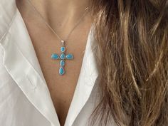 Turquoise Cross Pendant / Silver Large Turquoise Cross Necklace / Turquoise Cross Necklace / Large Cross Necklace / Layering Cross Necklace  FREE SHIPPING  WITHIN THE USA THIS LISTING IS FOR 1 TURQUOISE CROSS AVAILABLE WITH OR WITHOUT A CHAIN STERLING SILVER 925 NON TARNISH BEAUTIFUL HANDMADE TURQUOISE CROSS PENDANT  METAL: STERLING SILVER 925 STYLE: TURQUOISE STONES  PURITY: 925 SIZE: 38MM IN LENGTH WITHOUT THE LARGE LOOP AS IT IS WITH THIS ITEM ALL MY PIECES ARE HAND MADE. AND I STAND BEHIND E Elegant Turquoise Cross Jewelry, Handmade Turquoise Cross Necklace, Large Cross Necklace, Turquoise Cross Necklace, Turquoise Cross Pendant, Necklace Packaging, Turquoise Cross, Necklace Layering, Necklace Turquoise