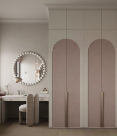 a room with two doors and a mirror on the wall next to a chair, vanity and stool