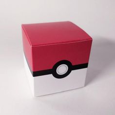 a red and white box that has a pokeball on it's front side