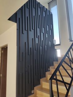 a stair case in front of a window