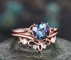 This ring is handmade by myself. The main stone is a 7mm round cut lab alexandrite . The accent stones are moissanites. The material is solid 14k gold(white,yellow,rose gold is also available) Ring size can be choose from the selection box. Matching band available: ?section_id=20674906 This jewelry can also be made in Wedding Ring Sets Vintage, Wedding Ring Sets Unique, Celtic Engagement Rings, Moissanite Ring Set, Black Wedding Band, Celtic Knot Ring, Agate Engagement Ring, Viking Ring, Alexandrite Engagement Ring