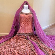 Absolutely Gorgeous, Light Pink, Heavy Ornate Work, Never Worn, 3 Piece Lengha Wedding Dress. Embellishments Include Bead Work, Crystals, Pearls, Sequins, And Gold Thread. Comes With Bridal Bag. Brand New, Never Worn, With No Tears Or Stains. Please Note, This Item Is Very Heavy Due To It's Ornate Design And For Bridal Wear. Lengha Measurements: Top: Shoulder: 15 Chest: 40 Hip: 38 Length: 25 Sleeve Length: 15 Skirt: Waist: 16 Inches Length: 44 Inches Fitted Hand Embellished Wedding Salwar Kameez, Wedding Fitted Hand Embellished Salwar Kameez, Pink Gown With Dabka Work For Wedding, Pink Wedding Gown With Dabka Work, Pink Anarkali Salwar Kameez Hand Embellished, Wedding Pink Sharara With Dabka Work, Anarkali Hand Embellished Pink Salwar Kameez, Traditional Pink Hand Embellished Salwar Kameez, Traditional Hand Embellished Purple Sets