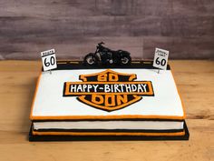 a birthday cake with a motorcycle on the front and number 60 on the back that says, happy - birthday - don't