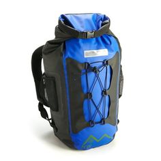 a blue and black backpack sitting on top of a white floor