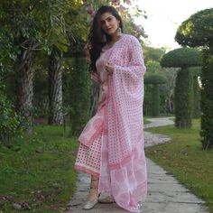 Grab this beautiful 3-piece set. The set comes with straight shape printed kurta has v neck, 3/4th sleeves & calf length teamed with printed trouser pants and a chanderi cotton dupatta to match. Color - Pink Kurta Fabric-Cotton Pant Fabric-Cotton Dupatta Fabric- Chanderi Cotton Neck-V Neck Sleeves-3/4th Sleeves Work - Print Detailing Washing Instructions-Dry Clean Model Height - 5.5 wearing size small. DISCLAIMER - The color of the product may be differ due to screen settings of device. A mispri Summer Straight Kurta With Set-in Sleeves, Eid Straight Kurta With Set-in Sleeves, Summer Pant Set With Dupatta And Straight Kurta, Summer Pant Set With Straight Kurta And Dupatta, Summer Mulmul Palazzo Set With Straight Kurta, Summer Palazzo Set With Straight Kurta In Mulmul, Traditional Spring Matching Set Kurta, Bollywood Style Mulmul Sets For Summer, Pink Mulmul Sets For Summer