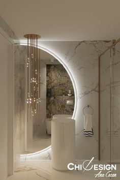 an elegant bathroom with marble walls and flooring