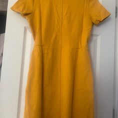 Must Have Wrap Dress. Versatile Solid Knee-length Lined Dress, Solid A-line Lined Dress, Lined Solid Dresses For Daywear, Solid Lined Dresses For Daywear, Solid Color Lined Dresses For Daywear, Lined Dress For Daywear, Lined Short Sleeve Mini Dress For Work, Short Sleeve Lined Mini Dress For Work, Yellow Shift Dress, Knee-length