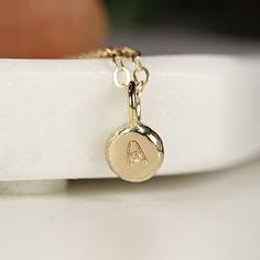 This lovely initial pendant was made of 14k solid gold rustic pebble and 14k solid gold chain. 14k gold pebble made by hand and hammered, hand stamped a letter on it. Pebble is 14k solid gold and rustic, approx. 5- 5.5mm Letter is 2mm and you can choose your font on the 6th picture. --------------------------------------- Meltem ♥ --------------------------------------- FOLLOW ME HERE: Instagram: @meltmjewelry Pinterest: www.pinterest.com/meltemsem Facebook: www.facebook.com/meltemsem Thanks for Pebble Necklace, Initial Necklace Gold, Solid Gold Chains, Etsy Personalized Gifts, Gold Initial, Solid Gold Jewelry, Initial Pendant, A Letter, Gold Pendant Necklace