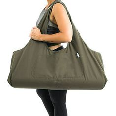 a woman carrying a large bag on her back