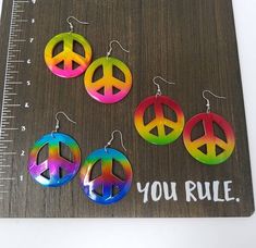 Check out this item in my Etsy shop https://www.etsy.com/listing/712170999/peace-earrings-peace-sign-earrings-peace Rasta Earrings, Peace Sign Earrings, Peace Jewelry, Symbol Earrings, Peace Earrings, Africa Earrings, Symbol Jewelry, Peace Bracelet, Black Drop Earrings