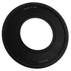 the lens hood is black and has a circular hole in it for an additional focal